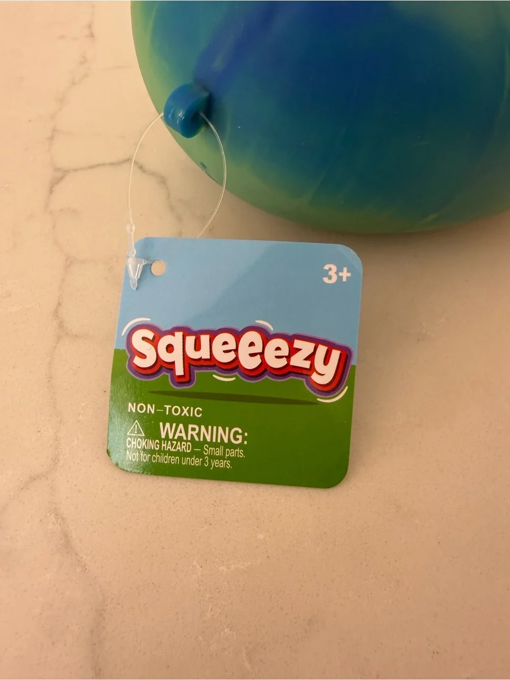 NWT Squeezy Rainbow Rubber Duck Bird Toy